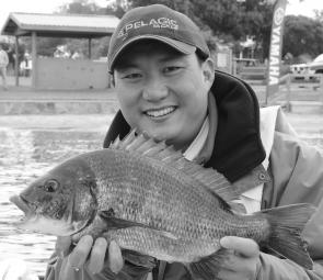 Sing Ling from Team SSBB with one of the great bream that helped to bring his team home with a wet sale on Sunday.